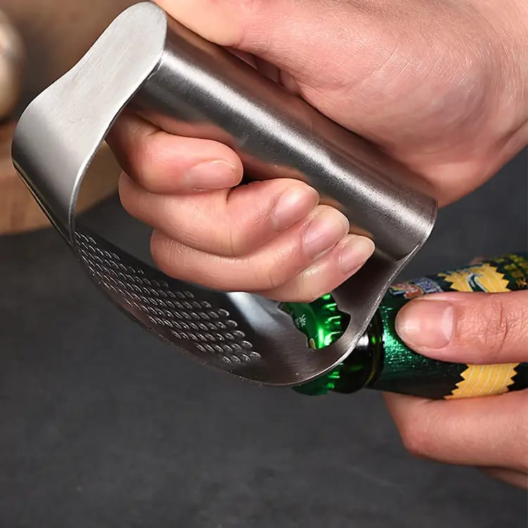 Stainless steel garlic press for kitchen use